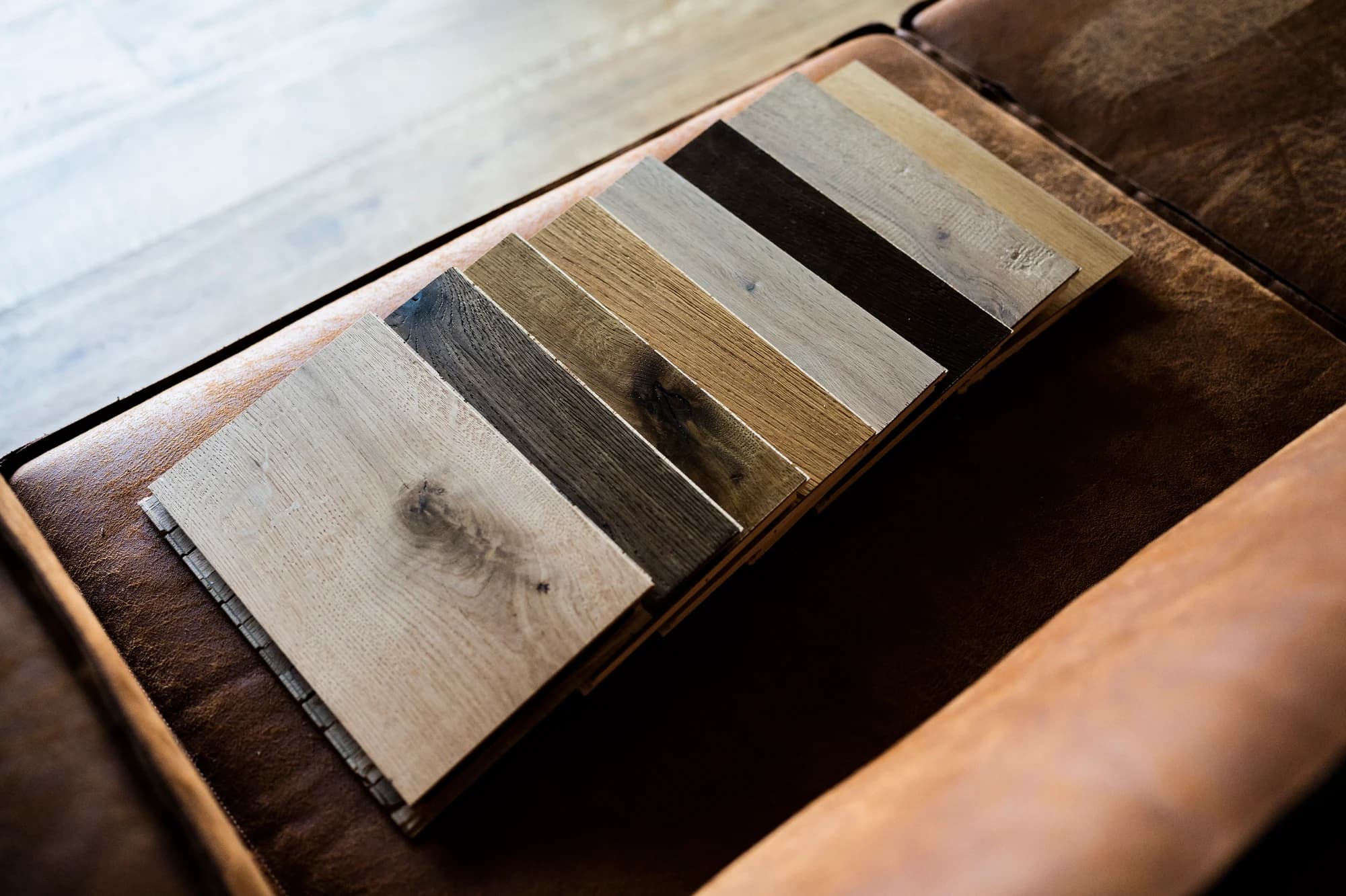 Parquet samples in natural daylight on a sofa